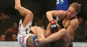 Ronda leva susto, mas finaliza Carmouche e faz história no UFC 157