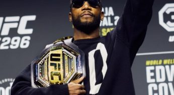 Leon Edwards exibe seus três cinturões do UFC em foto natalina com filho