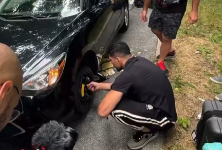 VÍDEO: Alex Poatan troca pneu de carro de fã às vésperas do UFC 303 e viraliza nas redes sociais